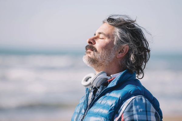 Man breathing the fresh air practicing breath work