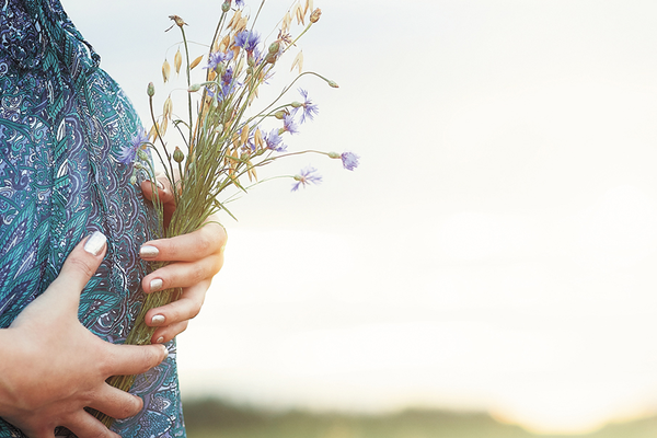 Woman pregnant through natural fertility