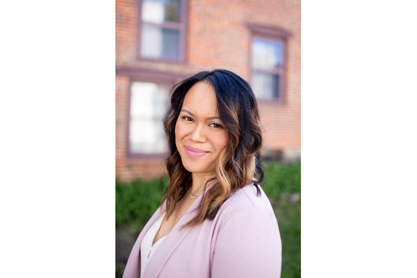 A headshot of Dr. Maris Stella Fraga