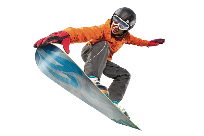 Snowboarding in the air grabbing front tip of board