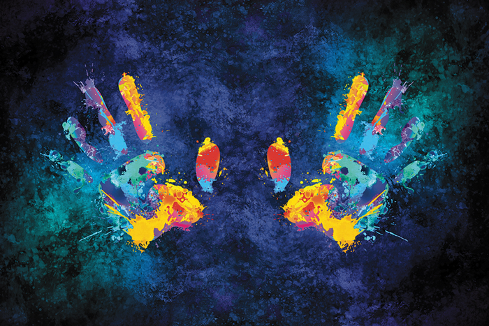 Rainbow colored child handprints